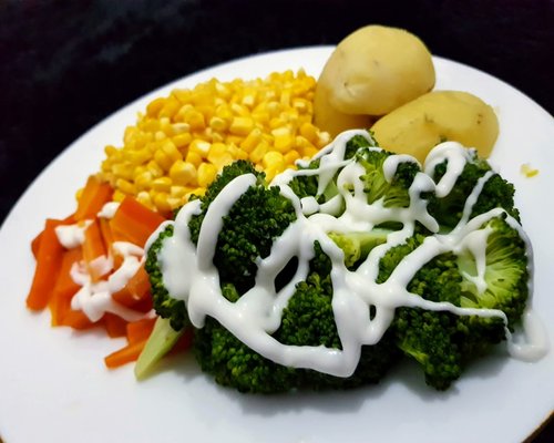 Healthy balanced diet plate with vegetables and seeds